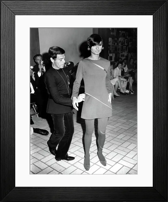 Framed Print : Rudi Gernreich dressing a model at a New York fashion show, 5 / 23 / 68. Courtesy: CSU Archives  /  Everett Collection