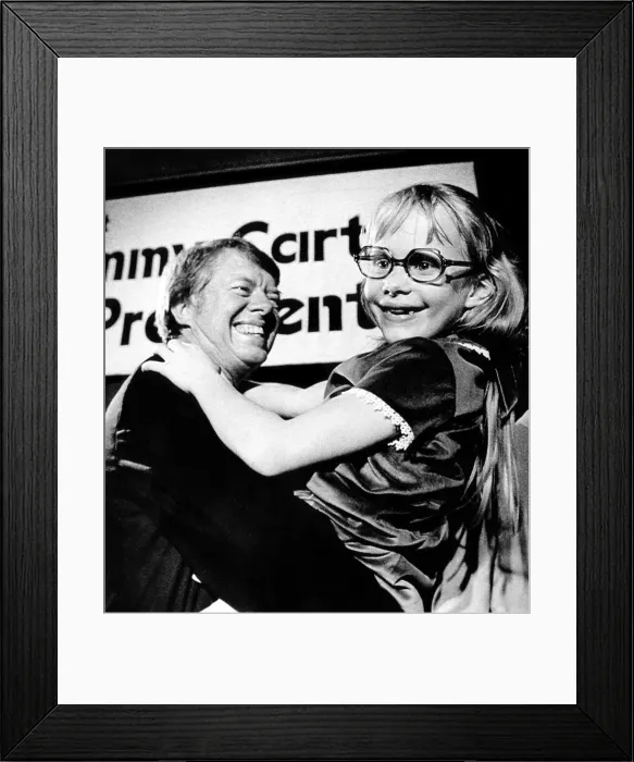 Framed Print : Governor Jimmy Carter of Georgia with his daughter, Amy, after he announced he would run for president, 1974. Courtesy: CSU Archives / Everett Collection