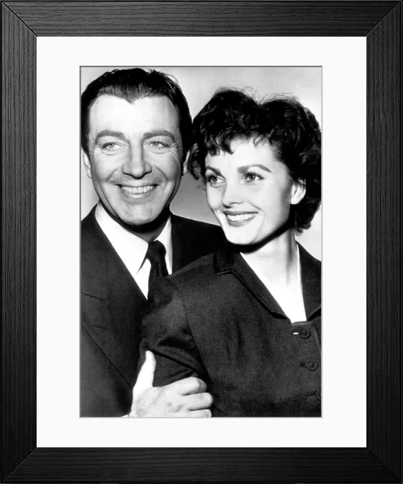 Framed Print : American actor Robert Taylor (left), with wife German actress Ursula Thiess, 1954.. Courtesy: CSU Archives / Everett Collection Framed Print : American actor Robert Taylor (left), with wife German actress Ursula Thiess, 1954.. Courtesy: CSU Archives / Everett Collection