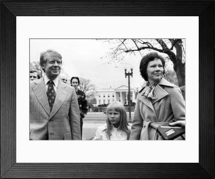 Framed Print : Presidential candidate Jimmy Carter, Amy Carter and Rosalynn Carter take a walk in Lafayette Park across from the White House, 1976. Courtesy: CSU Archives / Everett Collection