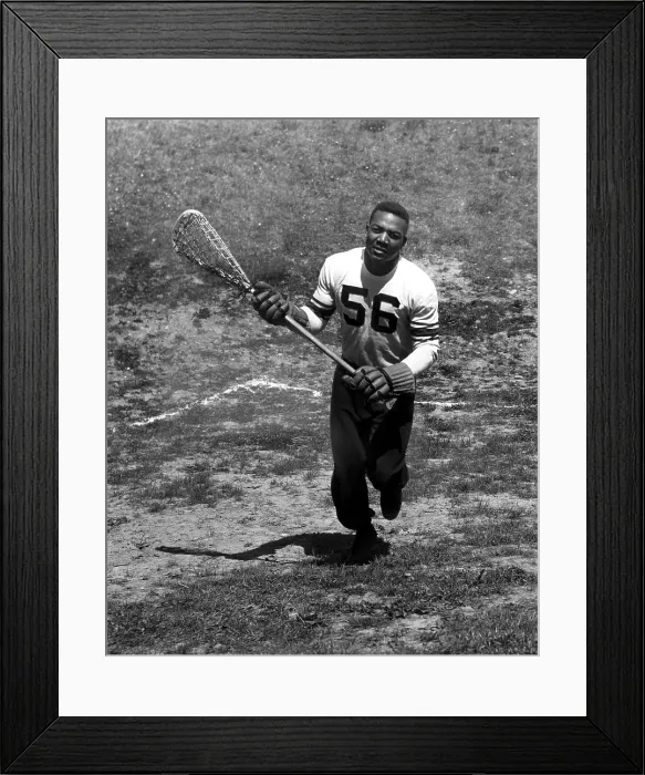 Framed Print : Jim Brown plays lacrosse for Syracuse University, 1957. Courtesy: CSU Archives / Everett Collection