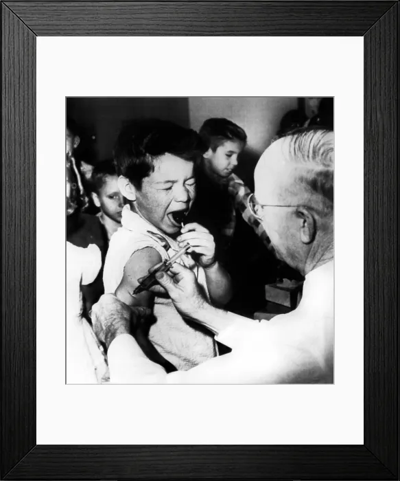Framed Print : Second Grader gets his Vaccination from Dr. Bryant O'Baker, circa 1950s. Courtesy: CSU Archives / Everett Collection Framed Print : Second Grader gets his Vaccination from Dr. Bryant O'Baker, circa 1950s. Courtesy: CSU Archives / Everett Collection