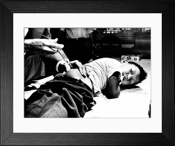 Framed Print : Young boy receives vaccination in St. Cloud, Minn. circa 1950s. Courtesy: CSU Archives / Everett Collection Framed Print : Young boy receives vaccination in St. Cloud, Minn. circa 1950s. Courtesy: CSU Archives / Everett Collection