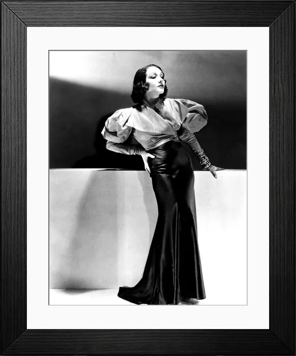 Framed Print : Lupe Velez wearing blue satin skirt with red taffeta jacket, 1933 Framed Print : Lupe Velez wearing blue satin skirt with red taffeta jacket, 1933