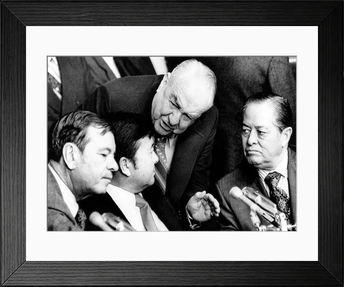 Framed Print : Herman Talmadge, Daniel Inouye, Sam Ervin and Joesph Montoya, democratic members of the Senate Watergate Commitee, hold a brief conference before the start of the hearing