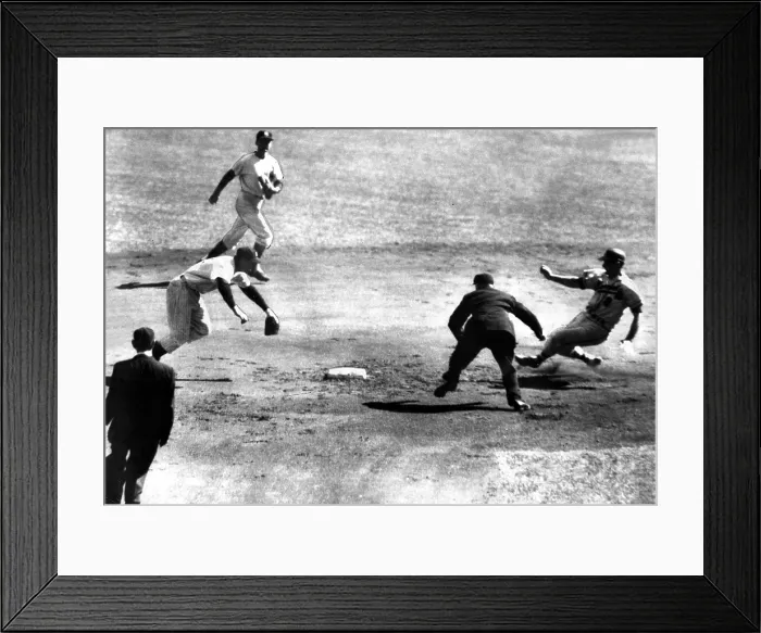 Framed Print : Milwaukee Brave Joe Adock slides into second base in Game 2 of the 1957 World Series. The New York Yankees are Gil MacDougald (front) and Jerry Coleman (rear)