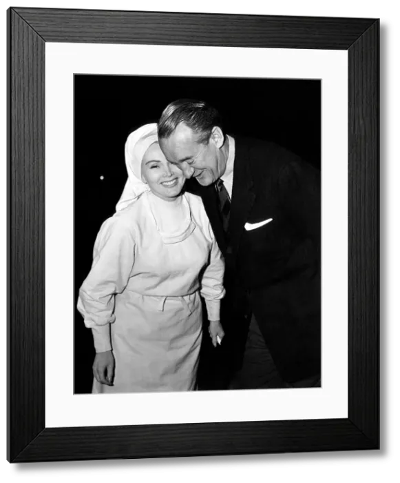 Framed Print : Zsa Zsa Gabor recieves a surprise visit from ex-husband George Sanders on the set of THE SECRET DIARY OF JOSEPH STALIN'.CSU Archives / Everett Collection