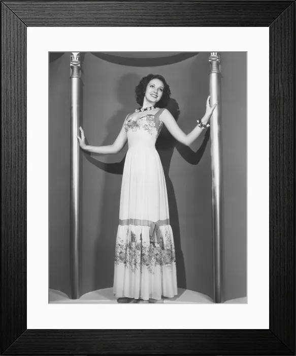 Framed Print : Linda Darnell in a white chiffon dance dress, 1939 Framed Print : Linda Darnell in a white chiffon dance dress, 1939