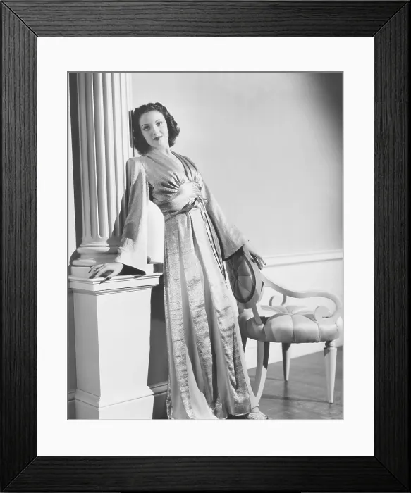 Framed Print : Linda Darnell in a tea gown designed by Royer, 1939 Framed Print : Linda Darnell in a tea gown designed by Royer, 1939