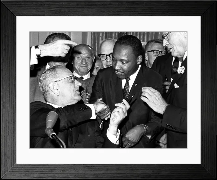 Framed Print : front row: President Lyndon Johnson handing a pen to Martin Luther King Jr. during the ceremonies for the signing of the Civil Rights bill at the White House, Washington D.C Framed Print : front row: President Lyndon Johnson handing a pen to Martin Luther King Jr. during the ceremonies for the signing of the Civil Rights bill at the White House, Washington D.C