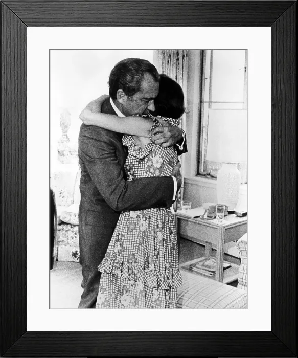 Framed Print : U.S. President Richard Nixon hugging his daughter Julie Nixon Eisenhower after informing her that he must resign, 1974.. Courtesy: CSU Archives / Everett Collection Framed Print : U.S. President Richard Nixon hugging his daughter Julie Nixon Eisenhower after informing her that he must resign, 1974.. Courtesy: CSU Archives / Everett Collection