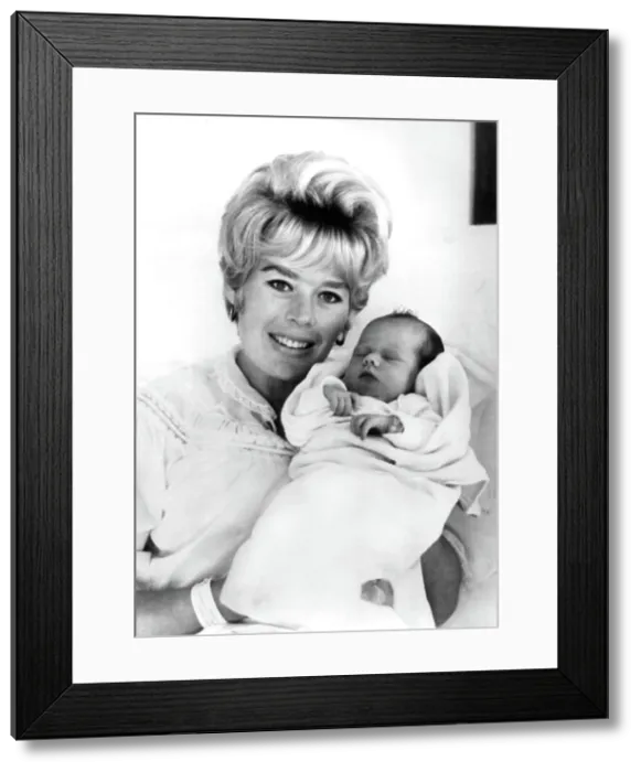 Framed Print : Barbara Thomason, with newborn daughter, Kimmy Sue Rooney, 1963. Courtesy: CSU Archives  /  Everett Collection