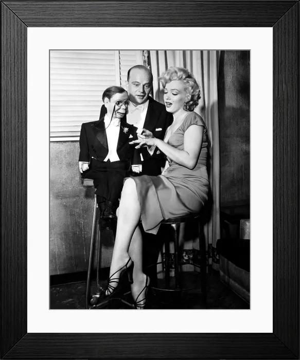 Framed Print : Edgar Bergen (center), and Marilyn Monroe (right), converse with ventriloquist dummy Charlie MaCarthy (left), 1952. Courtesy: CSU Archives / Everett Collection