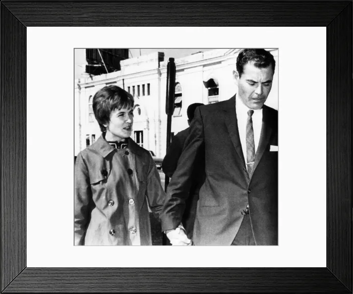 Framed Print : Marina Oswald Porter and Kenneth Porter on their way to a grand jury hearing in New Orleans