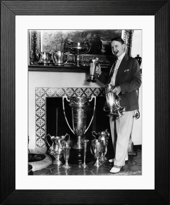 Framed Print : Racer Barney Oldfield (1878-1946), in his home with his trophies. Los Angeles, California, September 30, 1931. Courtesy: CSU Archives / Everett Collection Framed Print : Racer Barney Oldfield (1878-1946), in his home with his trophies. Los Angeles, California, September 30, 1931. Courtesy: CSU Archives / Everett Collection