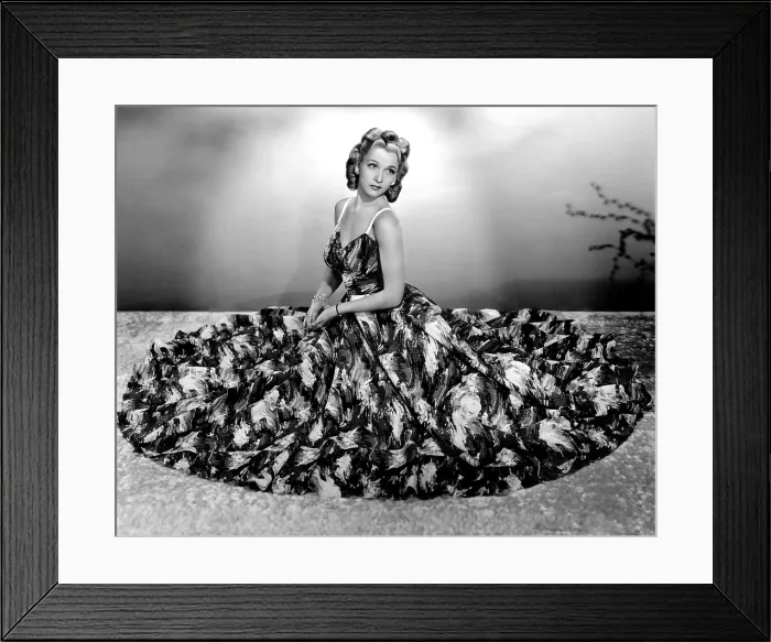 Framed Print : Carole Landis modeling seersucker evening gown in seafoam with accents of pique 1940 Framed Print : Carole Landis modeling seersucker evening gown in seafoam with accents of pique 1940