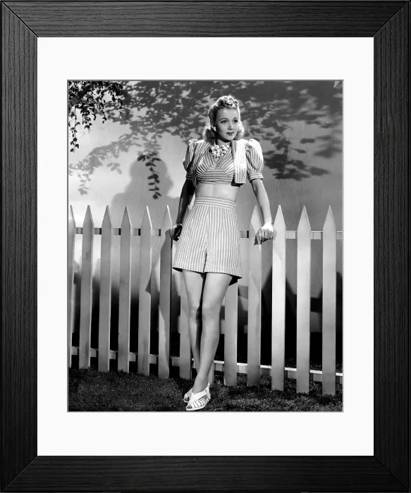 Framed Print : Carole Landis modeling striped shorts with matching bolero jacket, ca. 1940 Framed Print : Carole Landis modeling striped shorts with matching bolero jacket, ca. 1940