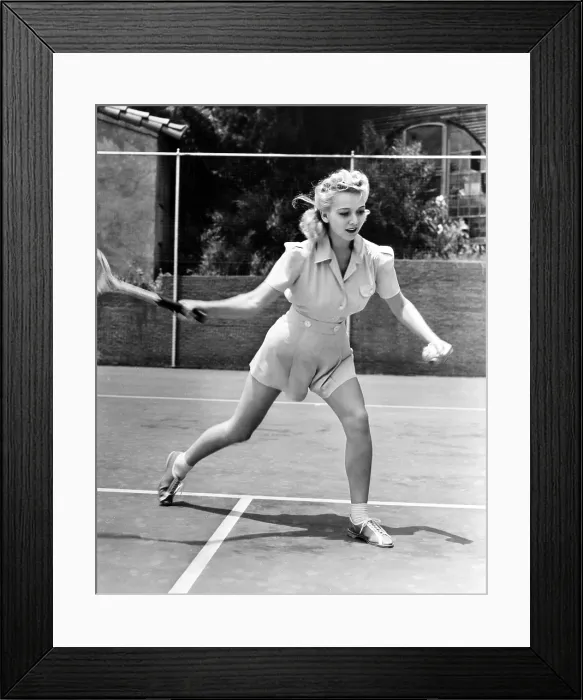 Framed Print : Carole Landis playing tennis, 1940