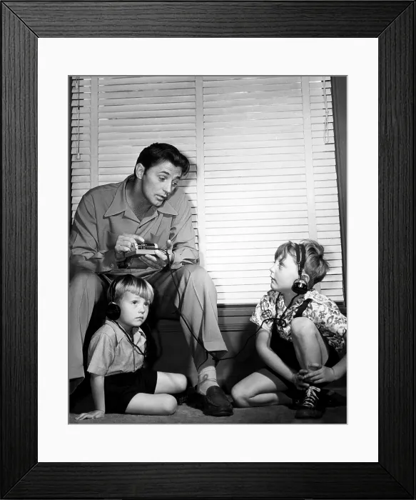 Framed Print : Robert Mitchum (top left), and his sons, Chris Mitchum (left), and Jim Mitchum (right), circa 1947. Courtesy: CSU Archives / Everett Collection Framed Print : Robert Mitchum (top left), and his sons, Chris Mitchum (left), and Jim Mitchum (right), circa 1947. Courtesy: CSU Archives / Everett Collection