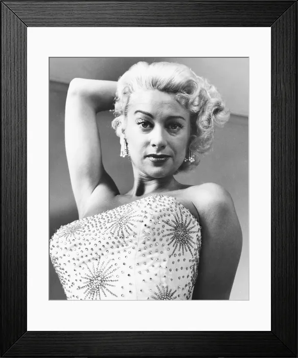 Framed Print : Martine Carol in white silk sarong encrusted with rhinestones, 1956 Framed Print : Martine Carol in white silk sarong encrusted with rhinestones, 1956