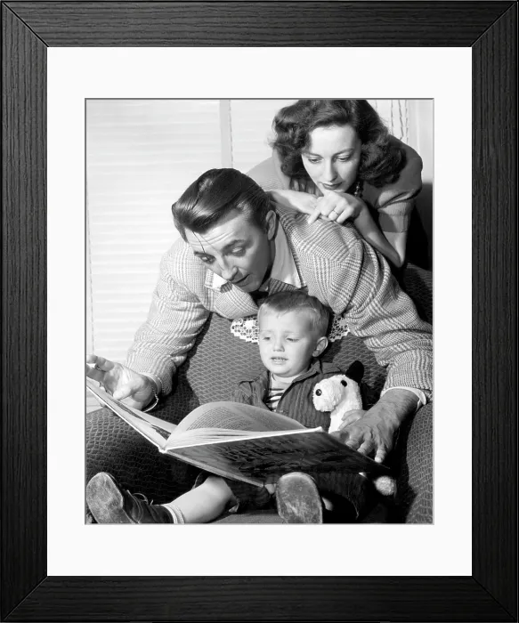 Framed Print : American actor Robert Mitchum (center), with his wife Dorothy Mitchum (top), and son Jim (bottom), 1947.. Courtesy: CSU Archives  /  Everett Collection