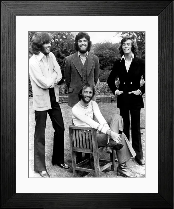 Framed Print : Bee Gees, (standing, l to r): Barry Gibb, Vince Melouney, Robin Gibb, (sitting): Maurice Gibb, ca. early 1970s. Courtesy: CSU Archives / Everett Collection Framed Print : Bee Gees, (standing, l to r): Barry Gibb, Vince Melouney, Robin Gibb, (sitting): Maurice Gibb, ca. early 1970s. Courtesy: CSU Archives / Everett Collection