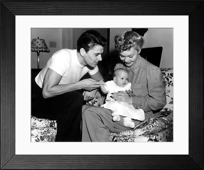 Framed Print : Ronald Reagan, Maureen Reagan, Jane Wyman at home, 4 / 26 / 41. Courtesy: CSU Archives  /  Everett Collection