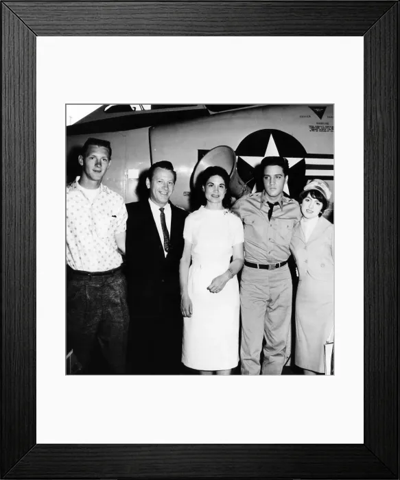 Framed Print : G.I. BLUES, Elvis Presley (second from right) visited by country singers Kitty Wells (center) and her husband Johnnie Wright (second from left), their son Bob Wright (far left)