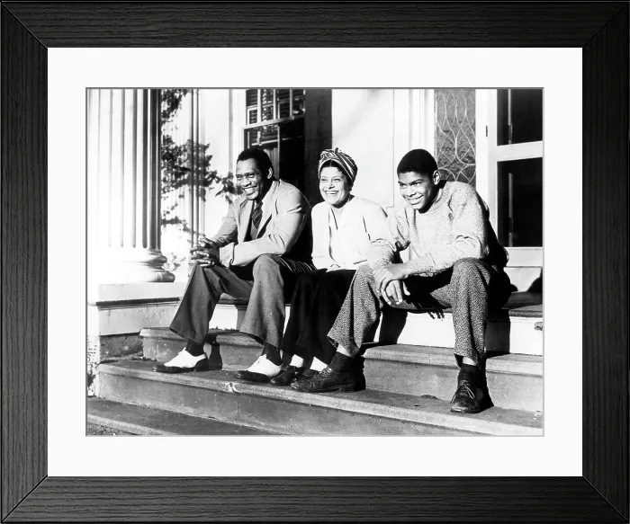 Framed Print : Paul Robeson, his wife Eslanda Goode Robeson, and their son Paul Robeson Jr. at their house in Enfield, Connecticut, c. 1940's.. Courtesy: CSU Archives  /  Everett Collection