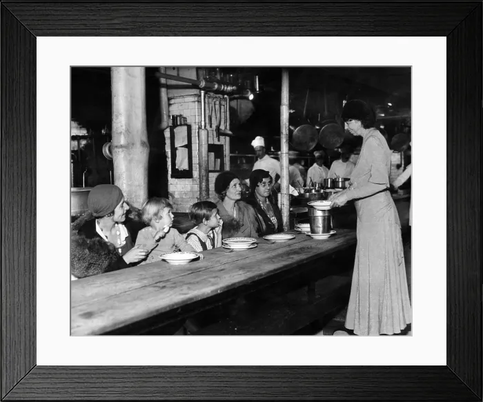 Framed Print : Future First Lady Eleanor Roosevelt (standing, right), serving meals to unemployed women at a restaurant in New York, December 1, 1932