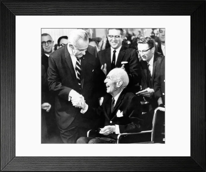 Framed Print : Foreground: President Lyndon Johnson (left), shaking hands with writer Upton Sinclair, (who wrote The Jungle, a criticism of the meat packing industry)