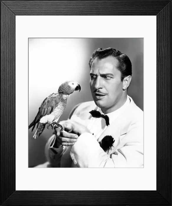 Framed Print : CHAMPAGNE FOR CAESAR, Vincent Price, and Caesar the parrot, 1950. Courtesy: CSU Archives / Everett Collection