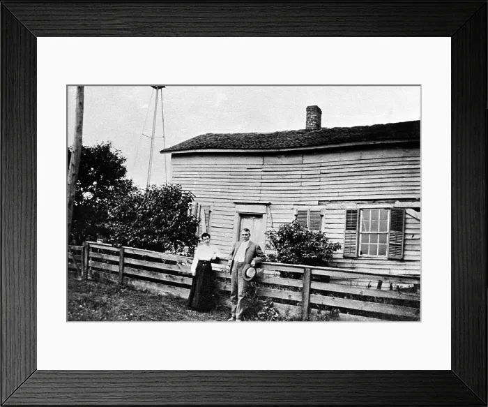 Framed Print : Warren G. Harding, 29th President of the United States (1921-1923) poses in front of his birthplace, Corsica, Ohio. Next to him is his cousin Ada, ca. 1910