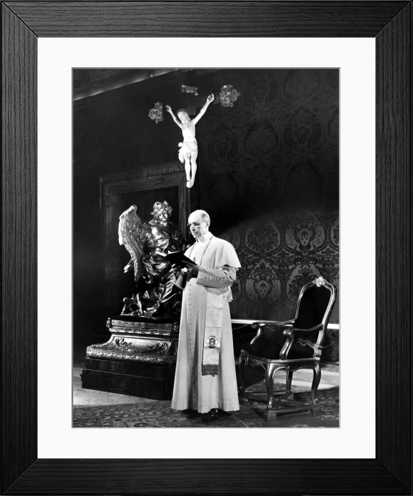 Framed Print : POPE PIUS XII, 1950.Filmed for television reading prayer book for Holy Year Appeal for victims of war.. Courtesy: CSU Archives / Everett Collection Framed Print : POPE PIUS XII, 1950.Filmed for television reading prayer book for Holy Year Appeal for victims of war.. Courtesy: CSU Archives / Everett Collection