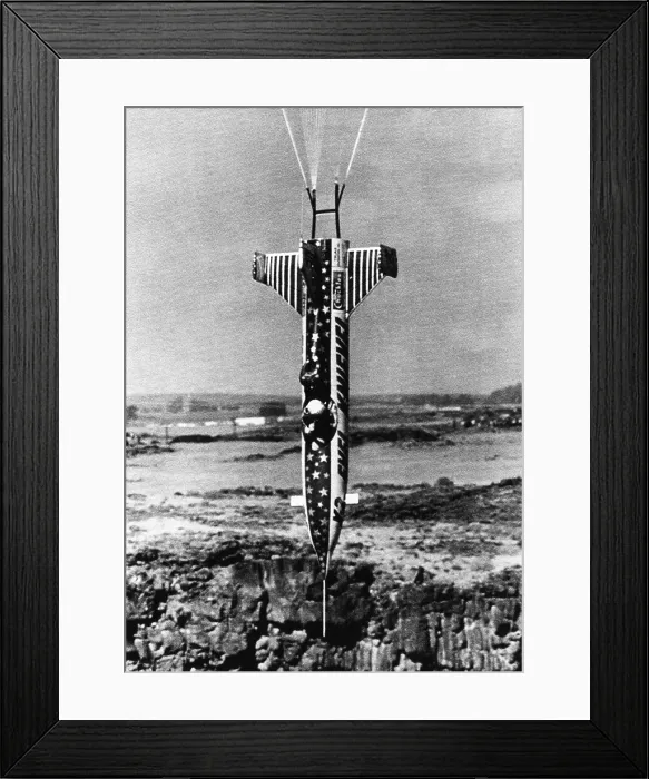 Framed Print : Evel Knievel and his rocket are suspended by parachute as he heads straight down into the Snake River Canyon, Twin Falls, Idaho, September 8, 1974 Framed Print : Evel Knievel and his rocket are suspended by parachute as he heads straight down into the Snake River Canyon, Twin Falls, Idaho, September 8, 1974