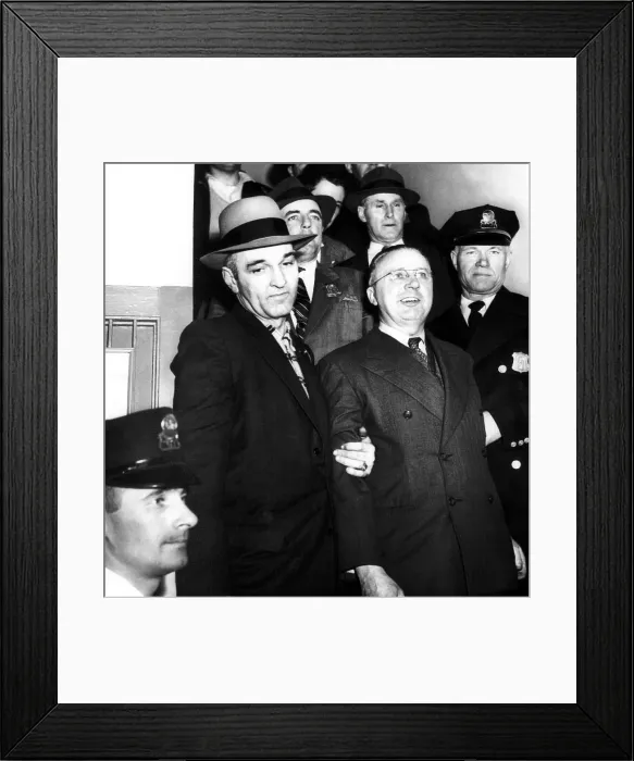 Framed Print : Foreground, center: George Metesky, (aka The Mad Bomber'), at his booking at Waterbury police station, Connecticut, January 22, 1957 Framed Print : Foreground, center: George Metesky, (aka The Mad Bomber'), at his booking at Waterbury police station, Connecticut, January 22, 1957