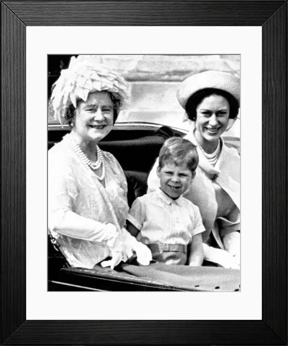 Framed Print : Queen Elizabeth (the Queen Mother), Princess Margaret (far right) and her son David Armstrong-Jones, Viscount Linley (center)