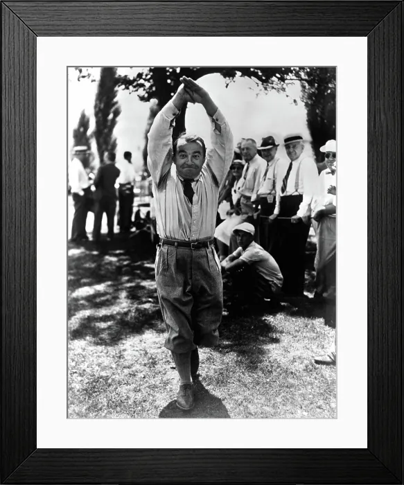 Framed Print : Golfer GENE SARAZEN gives himself a hand after shooting a 66 in Dapper Dan tournament, 8 / 12 / 39. Courtesy: CSU Archives  /  Everett Collection