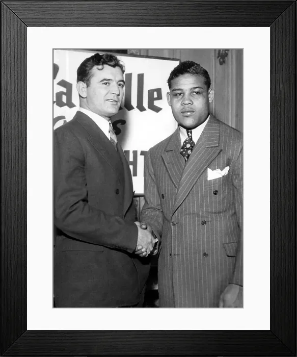 Framed Print : James Braddock and Joe Louis shake hands after signing contract for upcoming fight in Chicago, February 19, 1937