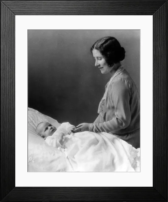 Framed Print : The Duchess of York, later the Queen Mother, with her new daughter Margaret, 1930. Courtesy: CSU Archives  /  Everett Collection