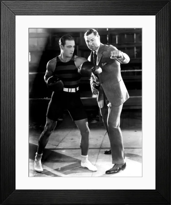 Framed Print : Ruldolph Valentino and heavyweight boxing champion Jack Dempsey at5 Valentino's studio in Hollywood. Ca. 1925. Courtesy: CSU Archives / Everett Collection Framed Print : Ruldolph Valentino and heavyweight boxing champion Jack Dempsey at5 Valentino's studio in Hollywood. Ca. 1925. Courtesy: CSU Archives / Everett Collection