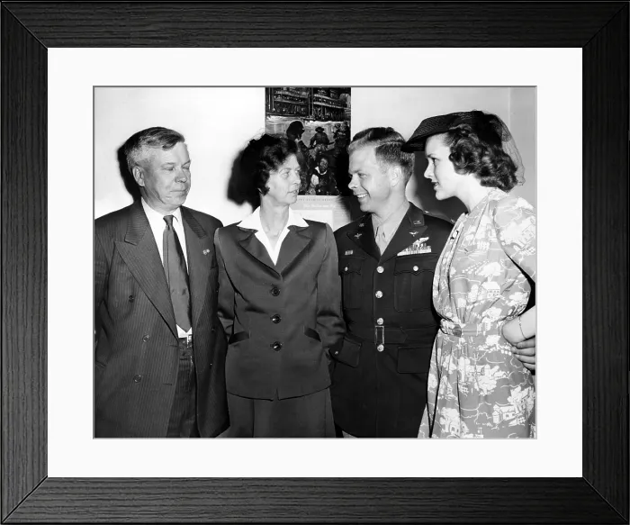 Framed Print : RICHARD BONG, World War II Fighter Pilot, L-R, Parents, Carl and Dora Bong, Richard I. Bong, Girlfriend, Marge Vattendahl, 05-13-44.. Courtesy: CSU Archives  /  Everett Collection