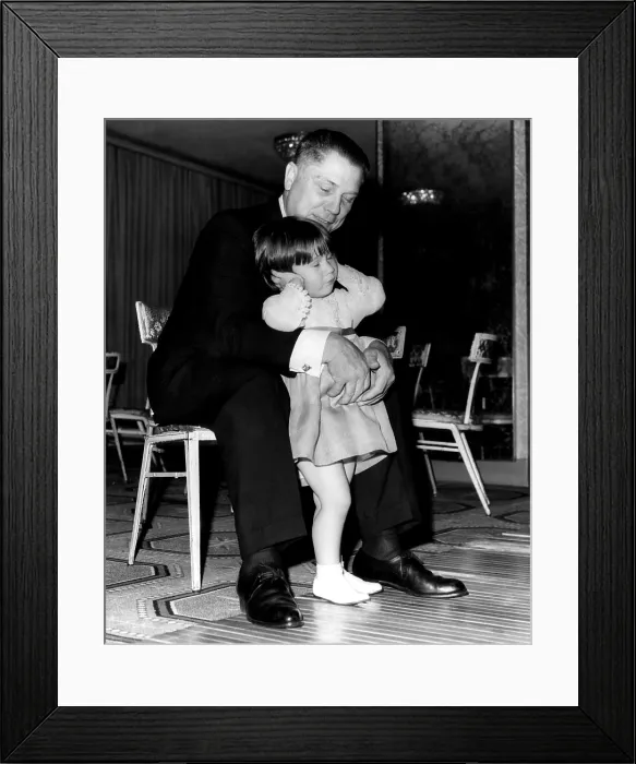 Framed Print : Presdent of the Teamsters Union, relaxes with his grandaughter, Barbara Jo Crancer at 2 1 / 2, before a testimonial dinner in his behalf. New York, New York, October 1965 Framed Print : Presdent of the Teamsters Union, relaxes with his grandaughter, Barbara Jo Crancer at 2 1 / 2, before a testimonial dinner in his behalf. New York, New York, October 1965