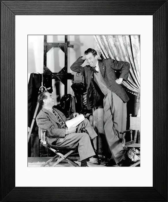 Framed Print : Frank Capra, James Stewart on the set of IT'S A WONDERFUL LIFE, 1946