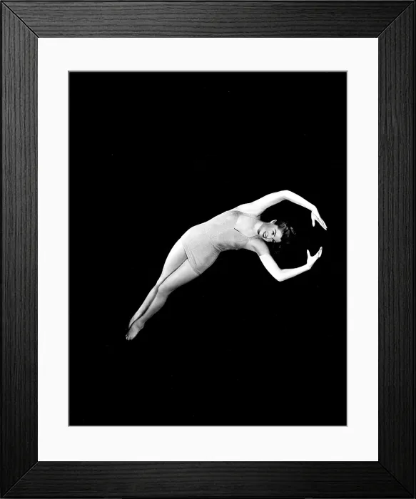 Framed Print : NEPTUNE'S DAUGHTER, Esther Williams in a swimming pose from one of her water ballets, 1949 Framed Print : NEPTUNE'S DAUGHTER, Esther Williams in a swimming pose from one of her water ballets, 1949