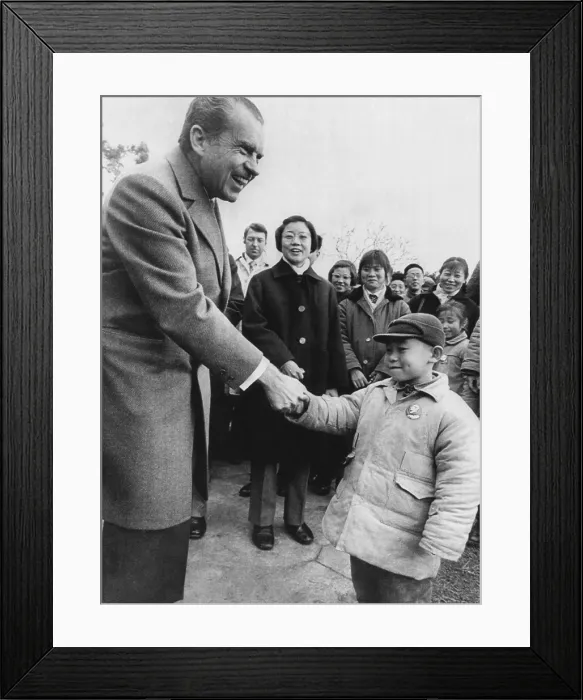Framed Print : U.S. President Richard Nixon shaking hands with a young boy in Hangzhou, China, February 26, 1972.. Courtesy: CSU Archives  /  Everett Collection