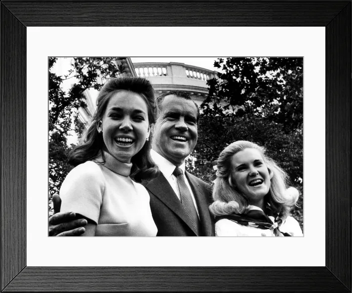 Framed Print : U.S. President Richard Nixon (center), with his daughters Julie Eisenhower (left), and Tricia Nixon, on Father's Day in the rose garden of the White House, Washington D.C Framed Print : U.S. President Richard Nixon (center), with his daughters Julie Eisenhower (left), and Tricia Nixon, on Father's Day in the rose garden of the White House, Washington D.C