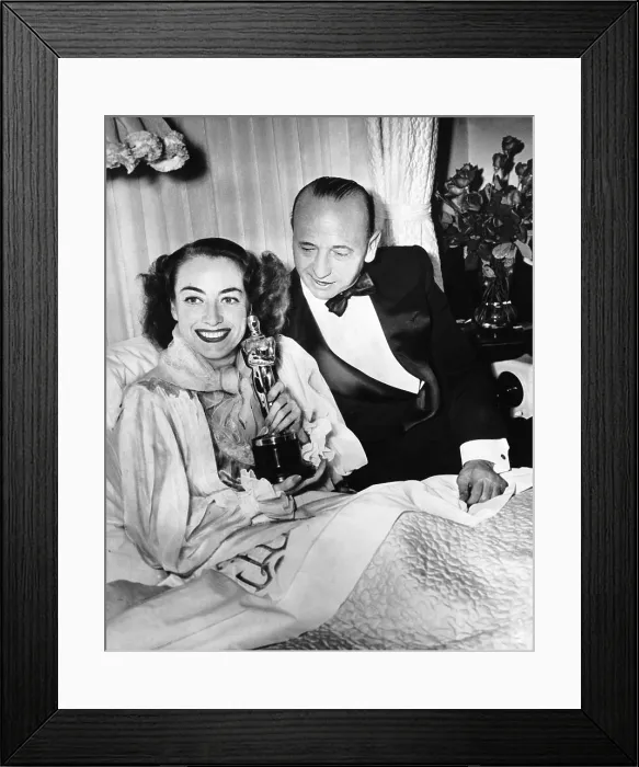 Framed Print : Joan Crawford, left, in bed with her MILDRED PIERCE Oscar and director Michael Curtiz, March 7, 1946 Framed Print : Joan Crawford, left, in bed with her MILDRED PIERCE Oscar and director Michael Curtiz, March 7, 1946