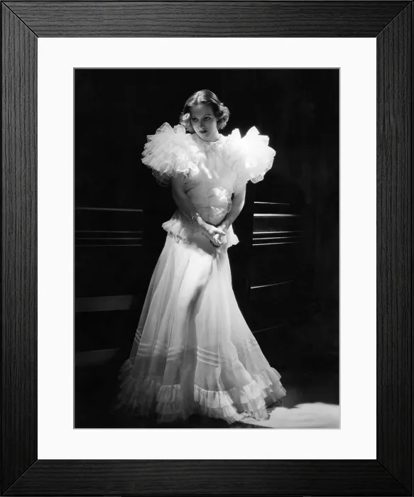 Framed Print : LETTY LYNTON, Joan Crawford, in a gown by Adrian, 1932
