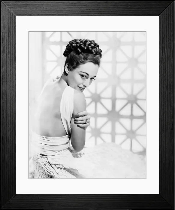Framed Print : THE SHINING HOUR, Joan Crawford, in a white silk gown with quilted skirt by Adrian, 1938 Framed Print : THE SHINING HOUR, Joan Crawford, in a white silk gown with quilted skirt by Adrian, 1938
